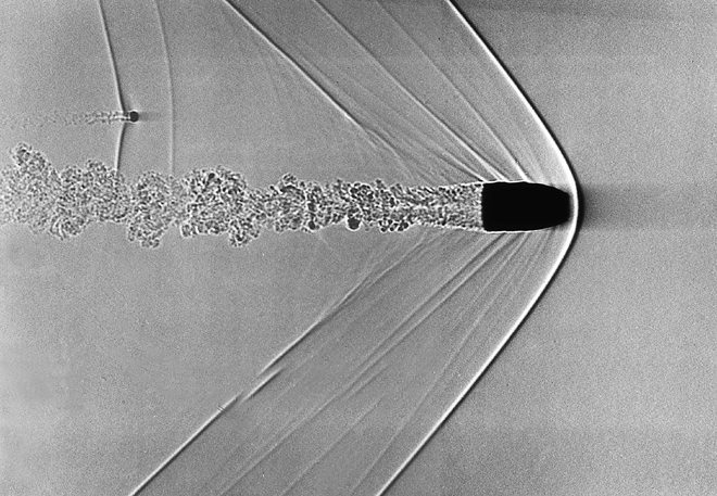 supersonic-bullet_660 A Shadowgraph image of a supersonic bullet. The Bow Shockwave is clearly visible as the V-shaped line at the front-most tip of the bullet