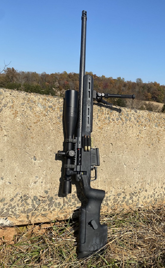 Custom rifle build on concrete wall